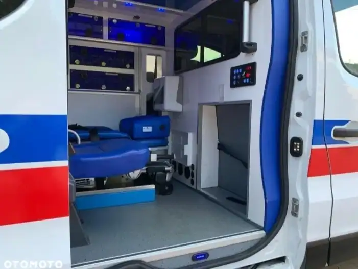 Mobility bus for disabled with specialized interior and wheelchair access.